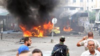 32 killed in blasts