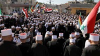 Sweida buried dozens