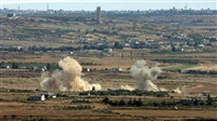 Syrian forces pound