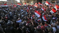 Iraqis defy crackdown