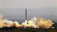 Iran’s Guards warn