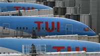 Tui warns of 8,000