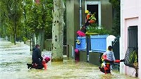 French rescuers search