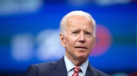 Biden caught between
