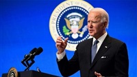 Biden tries to show