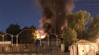 Assailants Burn Down
