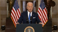 Biden threatens Putin