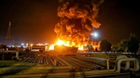 Fire erupts at oil